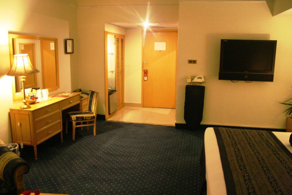 Smart Hotel Лахор Номер фото